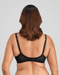 Model wears Mesmerise Underwire Bra in BLACK. On body back view
