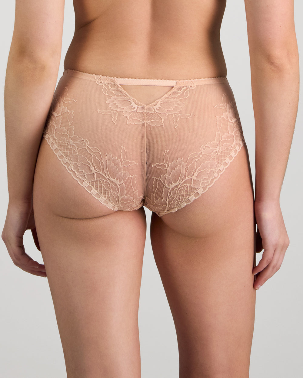 Model wears Golden Hour Full Brief in EVENING SAND. On body back view