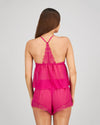 Model wears Eva Jean Short in FANTASY FUCHSIA. On body back view