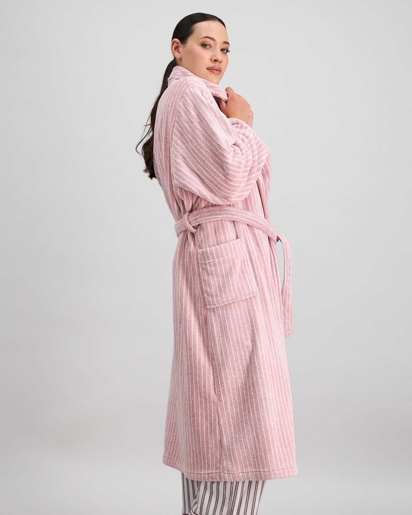 Model wears Marbella Robe in PINK MARL STRIPE. On body side view