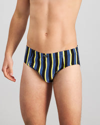 Model wears Cotton Stretch Mens Brief in YELLOW/REGATTA STRIPE. On body front view
