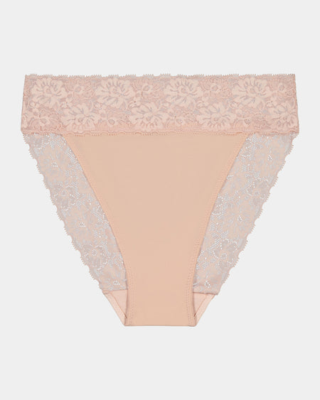 Model wears Lace Trim High Cut Brief in LATTE. On body front view