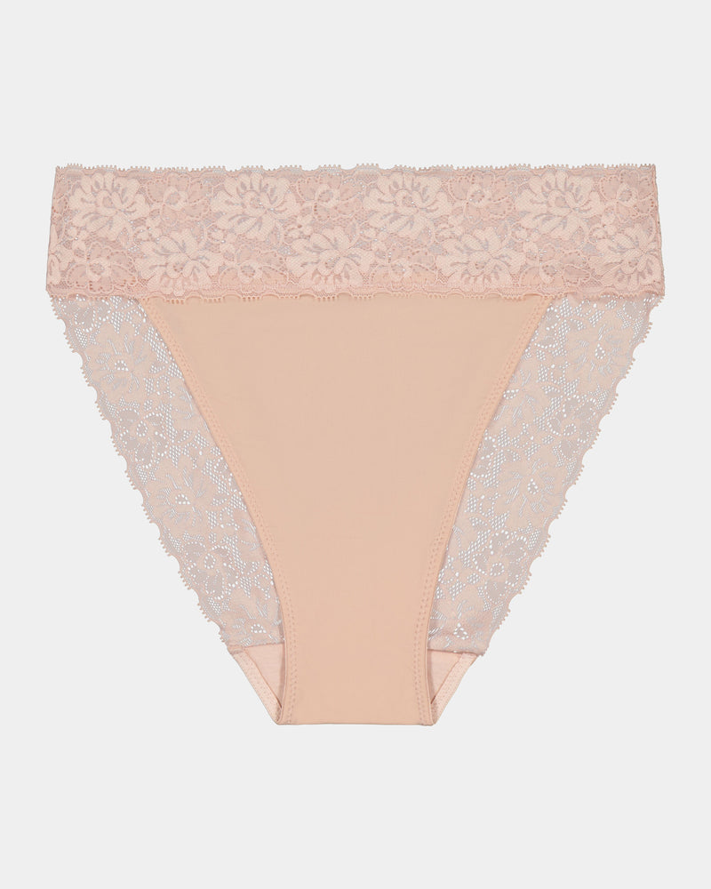 Model wears Lace Trim High Cut Brief in LATTE. On body front view