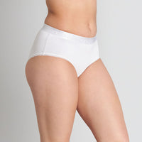 Model wears Cotton Logo Full Brief in WHITE. On body side view