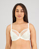 Model wears Dreamscape Underwire Bra in EGRET. On body front view