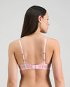 Model wears Lucille Underwire Bra in FAIRY TALE. On body back view