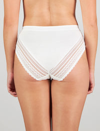 Model wears Angelica Midi in WHITE. On body back view