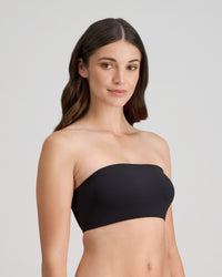 Model wears Extra-Ordinary Bandeau in BLACK. On body side view