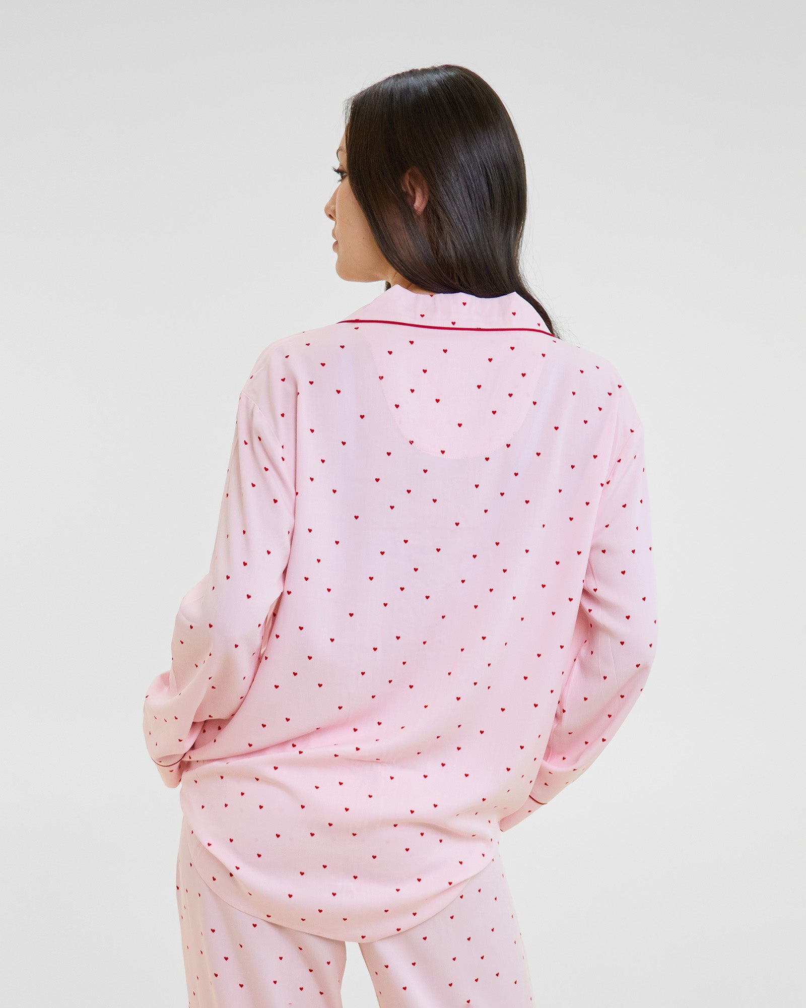 Model wears Hearts In Cabana Long Sleeve Pj Top in MINI HEART PRINT. On body back view