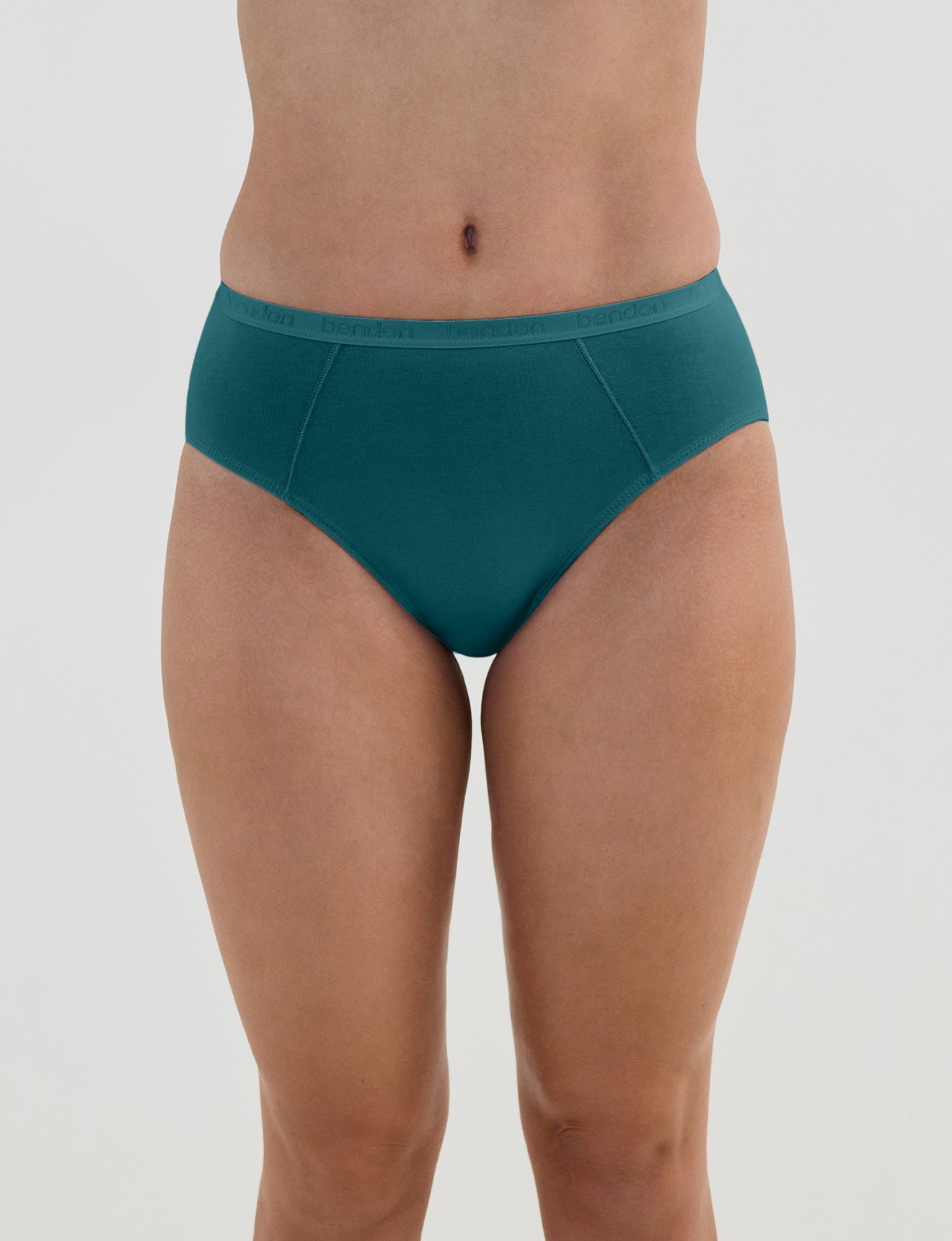 Model wears Body Cotton High Cut Brief in RAIN FOREST. On body front view