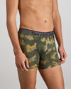 Model wears Everyday Active Mens Trunk in KOMBU CAMO. On body side view