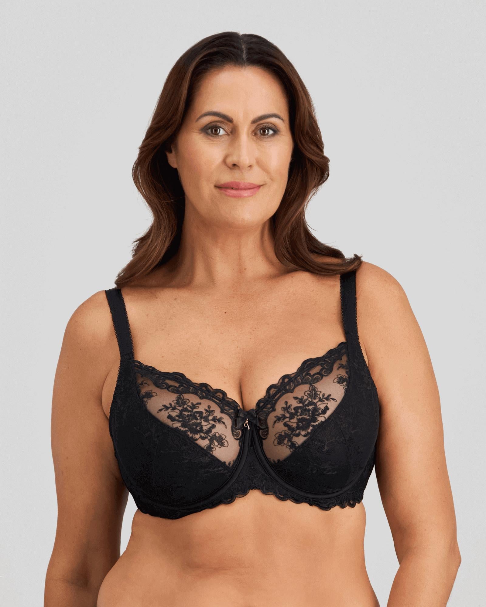 Model wears Mesmerise Underwire Bra in BLACK. On body front view