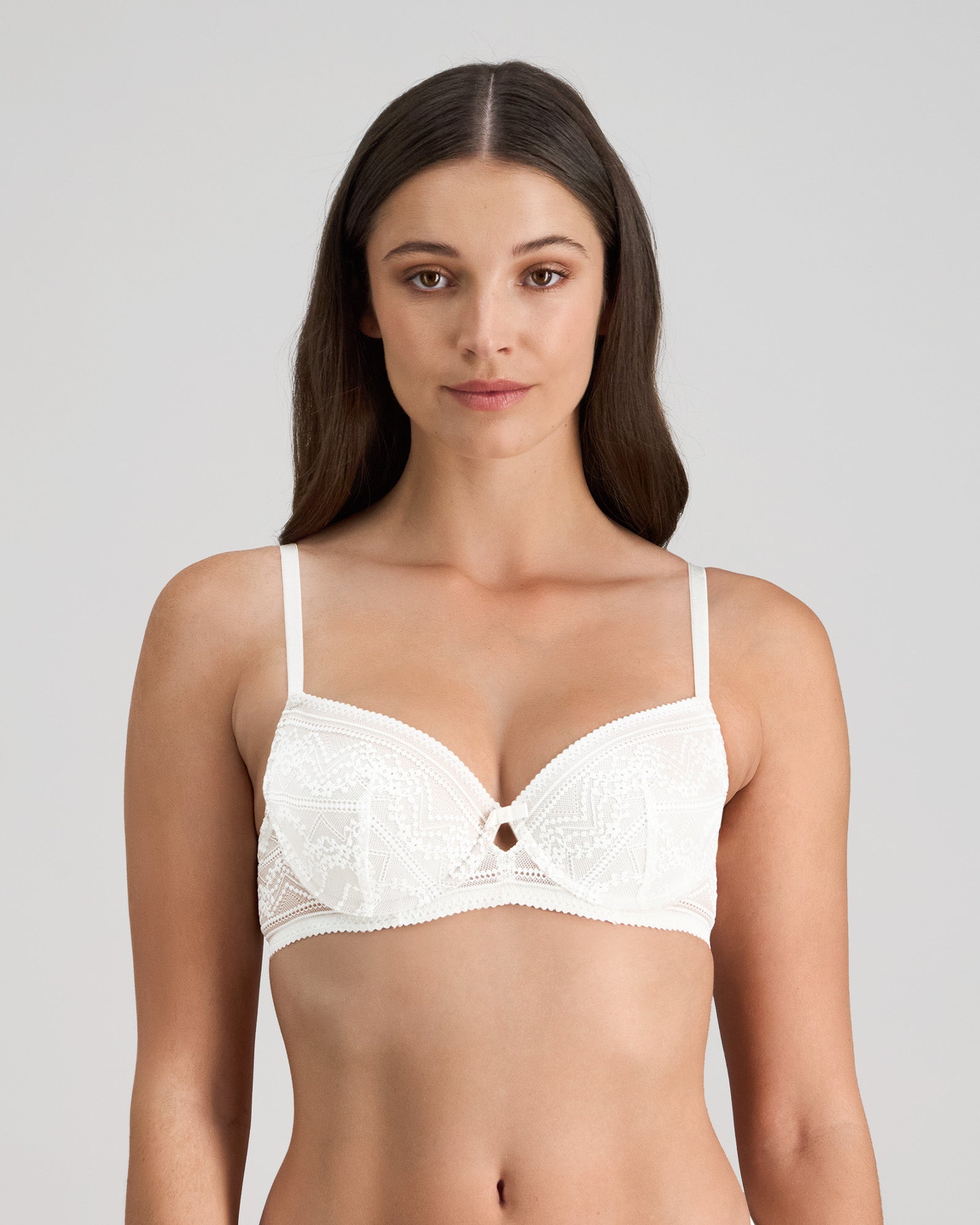 Model wears Renee Contour Bra in WHITE. On body front view
