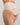 Model wears Midnight Express Full Brief in EGRET. On body front view