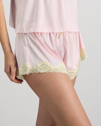 Model wears Dreamer Short in PALE LILAC. On body side view