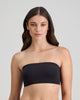 Model wears Extra-Ordinary Bandeau in BLACK. On body front view