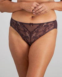 Model wears Vivacious High Cut Brief in PLUM PERFECT/LATTE. On body front view