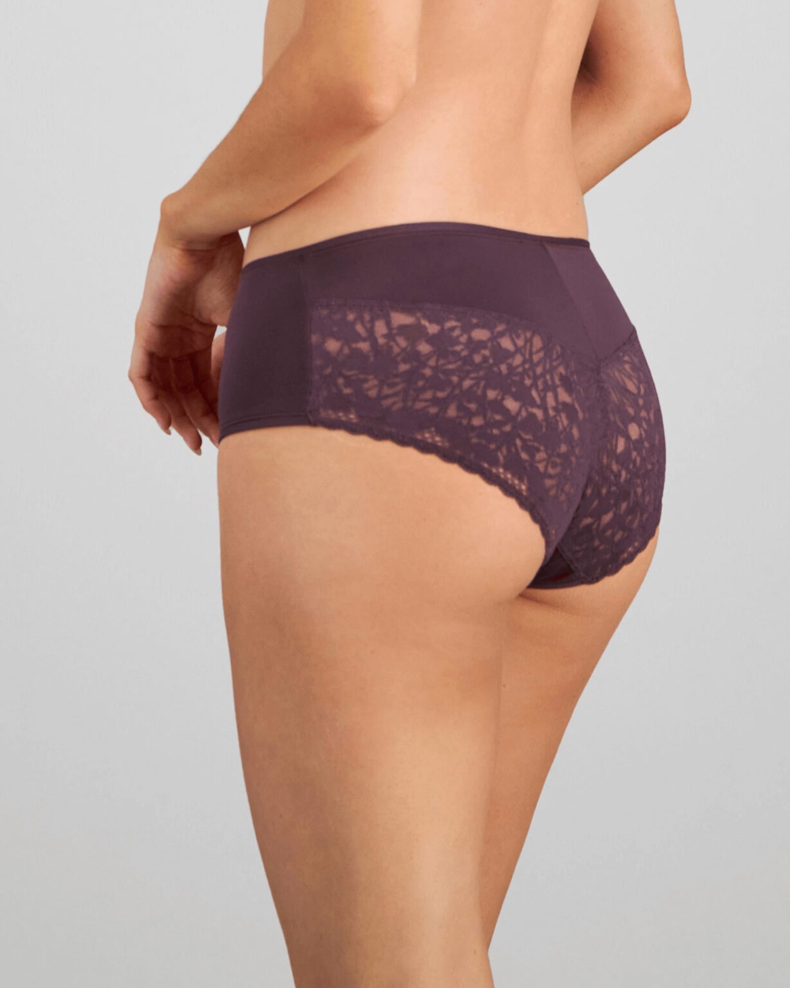 Model wears Hazel Midi in PLUM PERFECT. On body side view