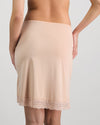 Model wears Understatement Slip in LATTE. On body back view