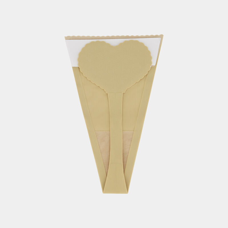 Model wears Stick On Thong 2Pk in Nude. On body back view