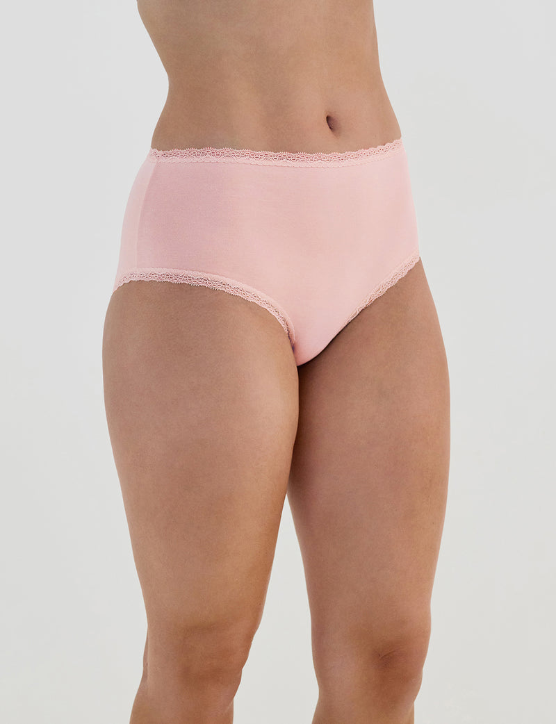Model wears Stretch Cotton Full Brief in ICY PINK. On body side view