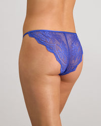 Midnight Muse Tanga in DAZZLING BLUE. Flat lay back view