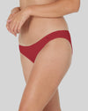 Model wears Clemence Bikini in JESTER RED. On body side view