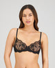 Model wears Romilly Underwire Bra in BLACK. On body front view