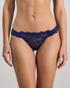 Model wears My Fit Lace Thong in Medieval Blue. On body front view