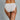 Model wears Body Cotton Bikini Twin Pack in RHUBARB/LINEN. On body back view