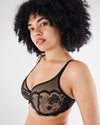 Model wears Romilly Underwire Bra in BLACK. On body side view