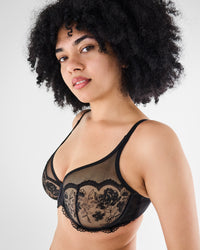 Model wears Romilly Underwire Bra in BLACK. On body side view