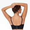 Model wears Castaspell Contour Long Line Bra in BLACK. On body back view