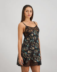 Model wears Lost Paradise Chemise in BLACK PRINT. On body side view