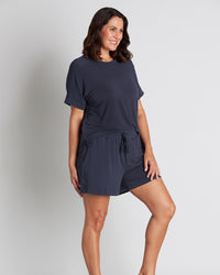 Model wears Sleep-Talk Short in NIGHT SKY. On body side view