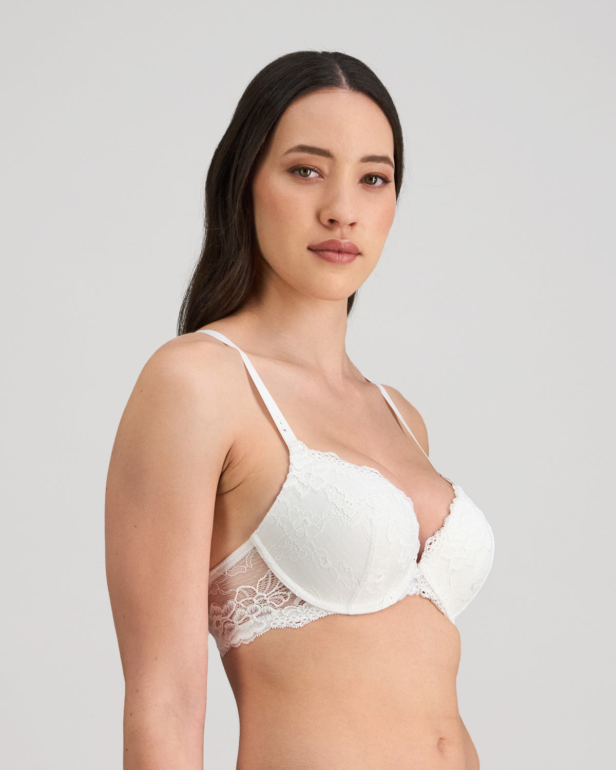Model wears My Fit Lace Push Up Bra in WHITE. On body side view