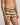 Model wears Rugby Stripe Mens Trunk in OLIVE/NUTRIA/OATMEAL. On body side view