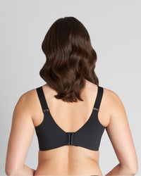 Model wears Motion Wire Free Front Opening Bra in BLACK. On body back view