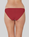 Model wears Clemence Bikini in JESTER RED. On body back view