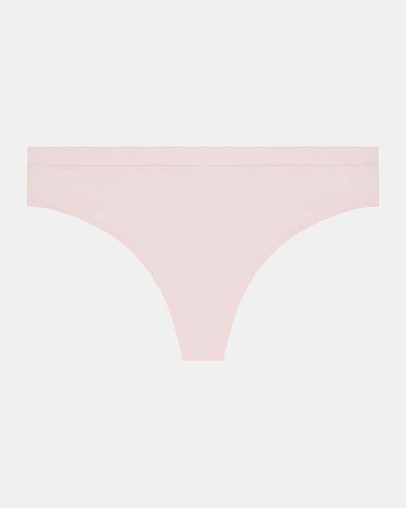 Seamless Soft Thong in ICY PINK. Flat lay front view
