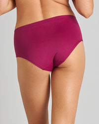 Model wears Seamless Full Brief in RASPBERRY RADIANCE. On body back view