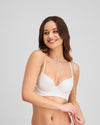 Model wears Play Contour Long Line Bra in WHITE. On body front view