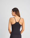 Model wears Simply Seamless Camisole in BLACK. On body back view