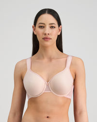Model wears Perfect Lines Contour Bra in PALE LILAC. On body front view