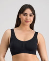 Model wears Bendon Essentials Crop Top in BLACK. On body front view