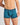 Model wears Bold Stripe Mens Trunk in DEEP TEAL/DEEP LAKE. On body front view