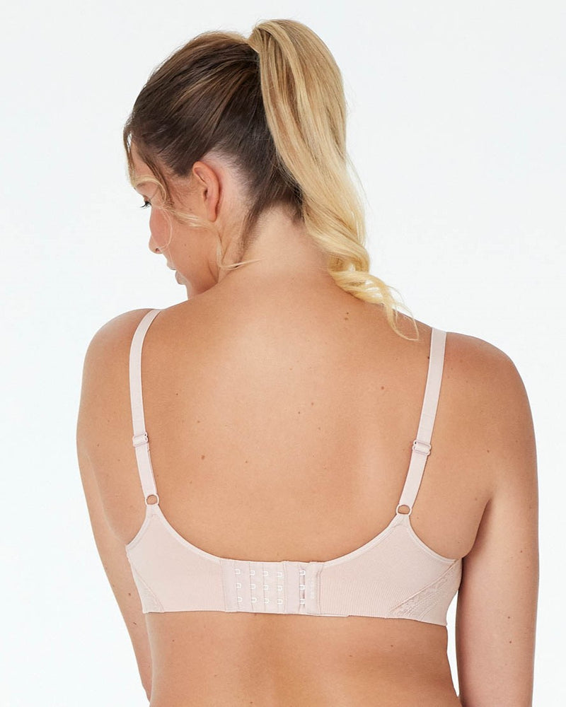 Model wears Bendon Nurture Maternity Bra in LATTE. On body back view