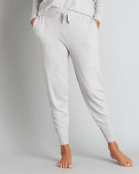 Model wears Insomnia Jogger in LIGHT GREY MARLE. On body front view
