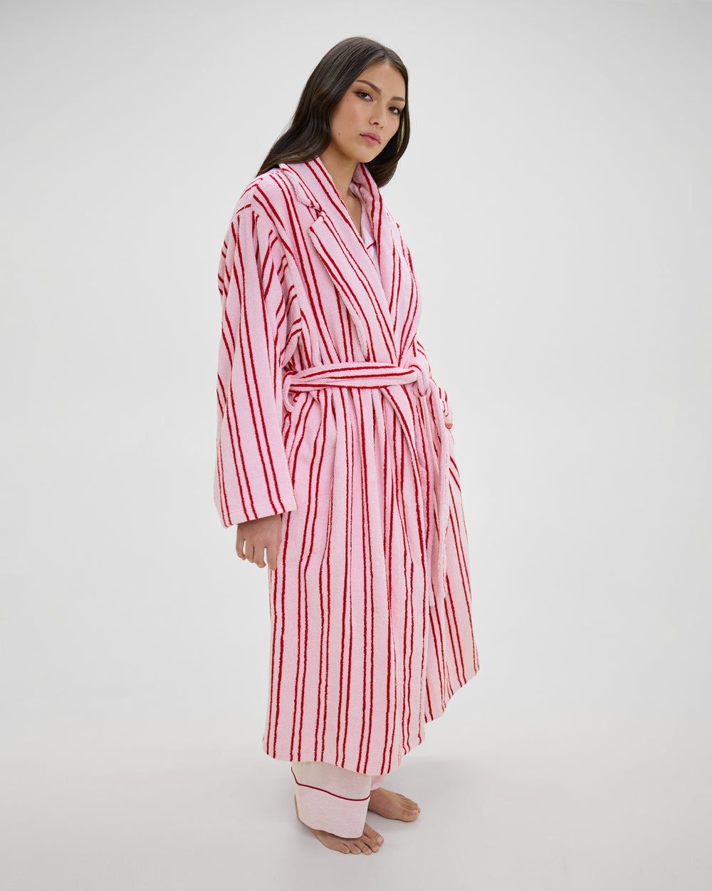 Model wears Riviera Robe in PALE LILAC/SALSA RED. On body side view