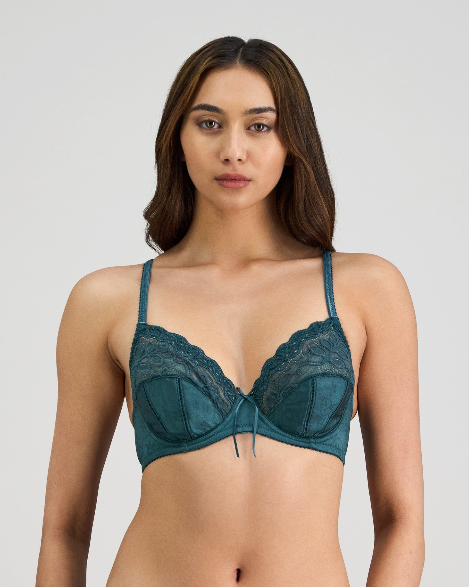 Model wears Yvette Underwire Bra in MEDITERRANEA. On body front view